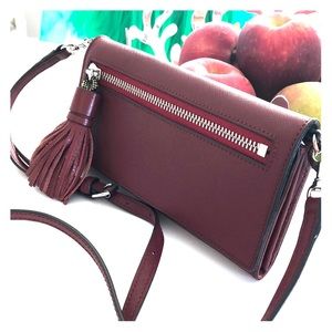 Gently used Rebecca Minkoff wallet on a strap